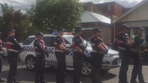 Article image for Dozens of police move in on Bendigo Street squatters
