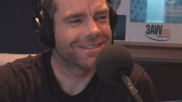Article image for Cadel Evans discusses his new book with Neil Mitchell in studio