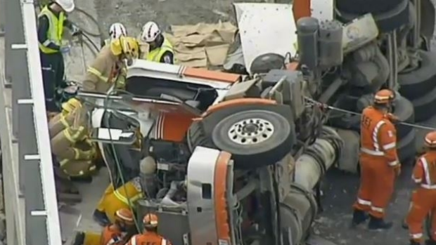 Article image for Driver freed after truck rolled in Dandenong South