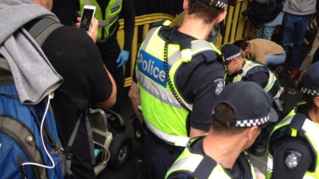 Article image for Violent clashes outside Flinders Street Station as police remove homeless camp