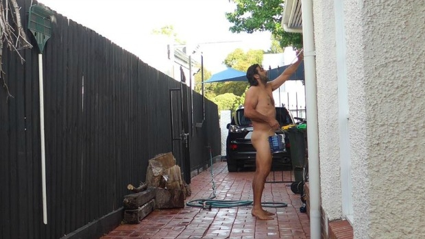 Article image for Bentleigh man protests in the nude after new house looks into his backyard