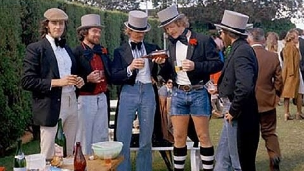 Article image for The hunt is on for group of dapper men pictured at the 1974 Melbourne Cup