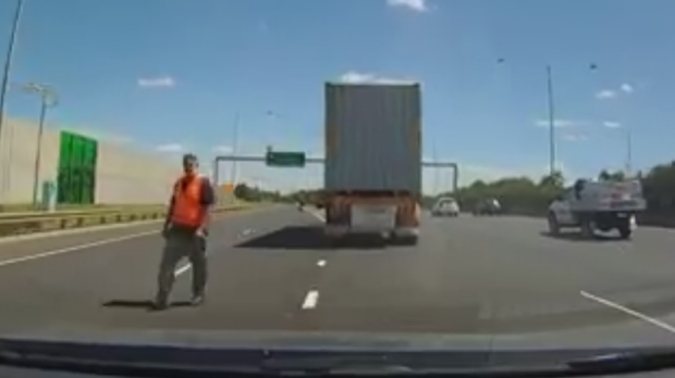 Article image for WATCH: Dash-cam captures man nearly being hit by truck on Princes Freeway