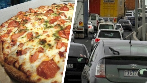 Article image for Woman orders pizza for busload of kids stuck in traffic on the Princes Freeway