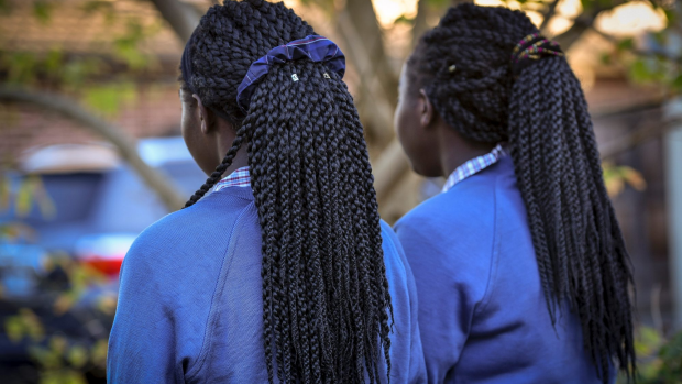 Article image for Twins asked to remove hair braids at school claim their culture has been ‘attacked’