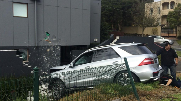 Article image for Man, 80, crashes luxury car into Toorak home