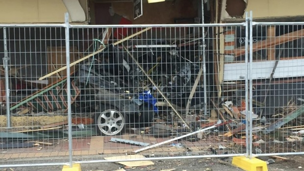 Article image for Mercedes Benz remains stuck under Kalkallo Pub after weekend crash