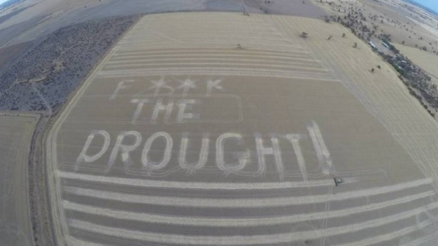 Article image for Farmer writes ‘f— the drought’ in paddock