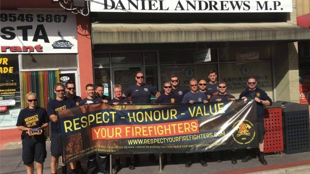 Article image for Firefighters protest outside office of premier Daniel Andrews