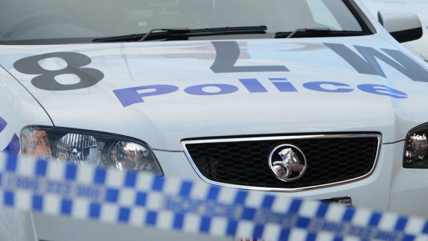 Article image for Two men robbed a family at gunpoint early Sunday morning at Ivanhoe East