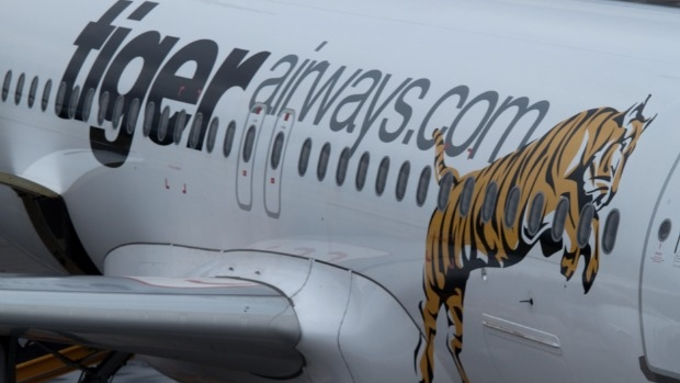Article image for Four people treated after ‘unusual odour’ detected on Tiger plane bound for Melbourne