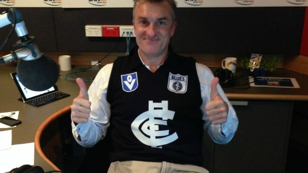 Article image for Is it OK for an adult to wear a football guernsey? Tom Elliott told he shouldn’t
