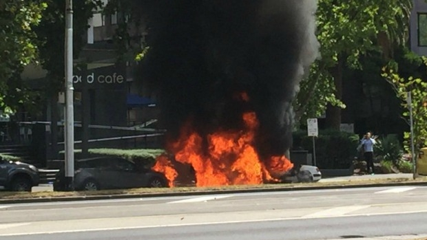 Article image for Car bursts into flames on St Kilda Road