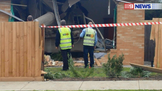 Article image for Driver killed after his truck crashes into a home at Apollo Bay