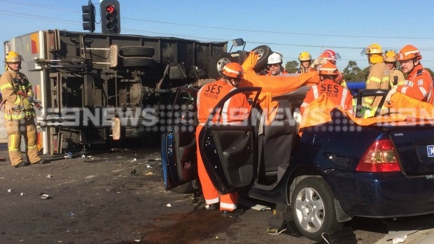 Article image for Two hurt as truck collides with car on Peninsula Link at Frankston