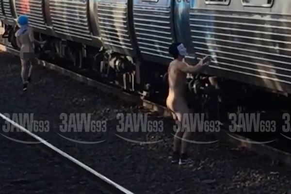 Article image for Video: Naked men graffiti smut on Melbourne train