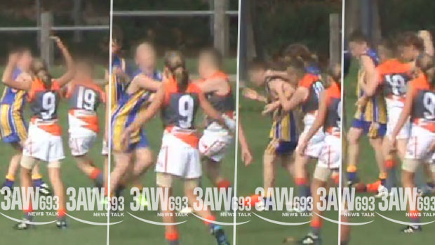 Article image for Confronting junior footy clash captured on camera