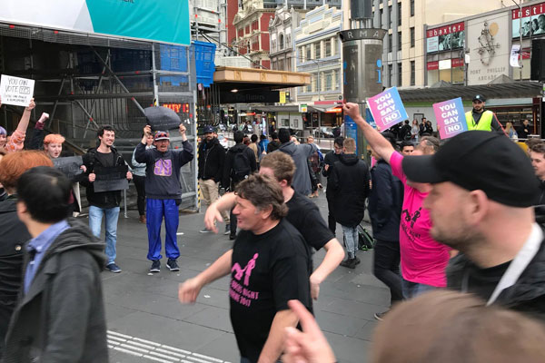 Article image for Same-sex marriage activists change ‘no’ campaign signs at Flinders Street