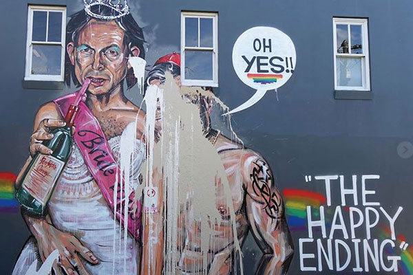 Article image for Mural featuring Tony Abbott and Cardinal George Pell in celebration of ‘yes’ vote vandalised