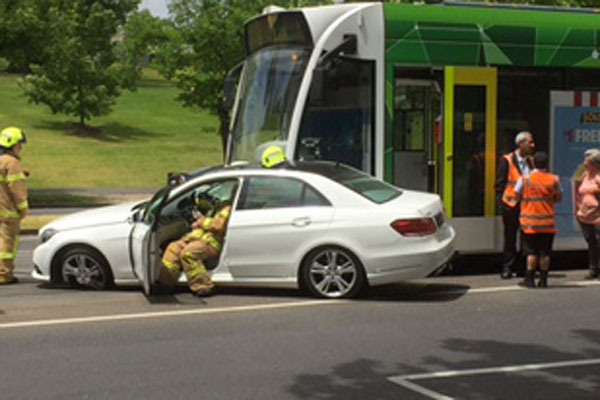 Article image for Trams banked back after car and tram collide on St Kilda Road