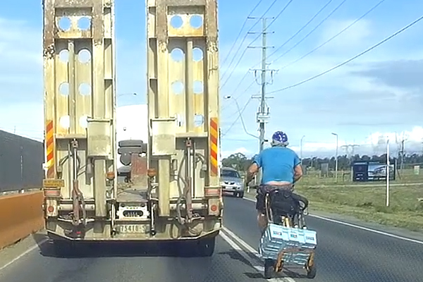 Article image for Video: Cyclist dangerously swerves through traffic on busy road