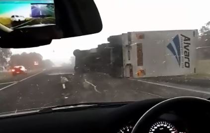 Article image for Wild weather topples truck on the Hume Freeway