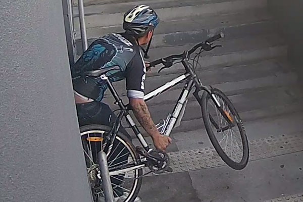 Article image for Cyclist hurls Molotov cocktail into car park and rides off