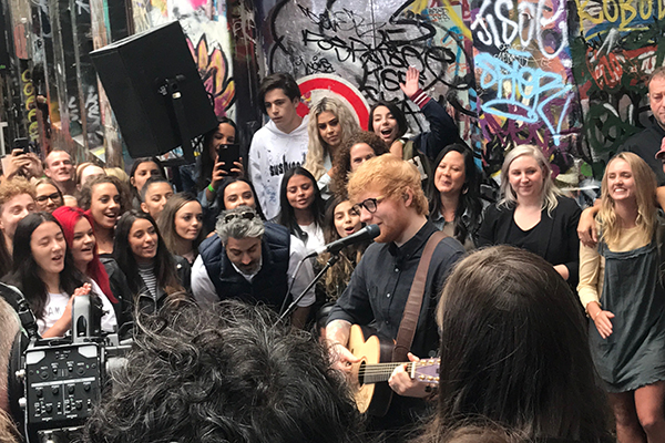 Article image for Fans gathering in Hosier Lane for performance by Ed Sheeran