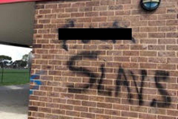 Article image for ‘Downright abhorrent’ racist slurs sprayed across walls at suburban soccer club