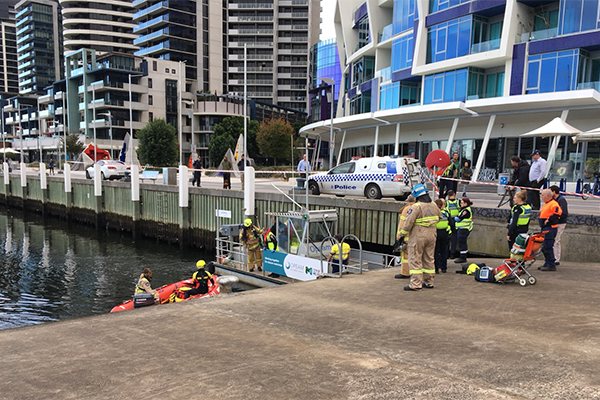 Article image for Man trapped under Docklands pier