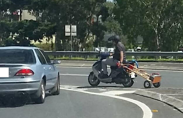 Article image for Rumour File: Scooter rider snapped carrying spare battery on hand trolley