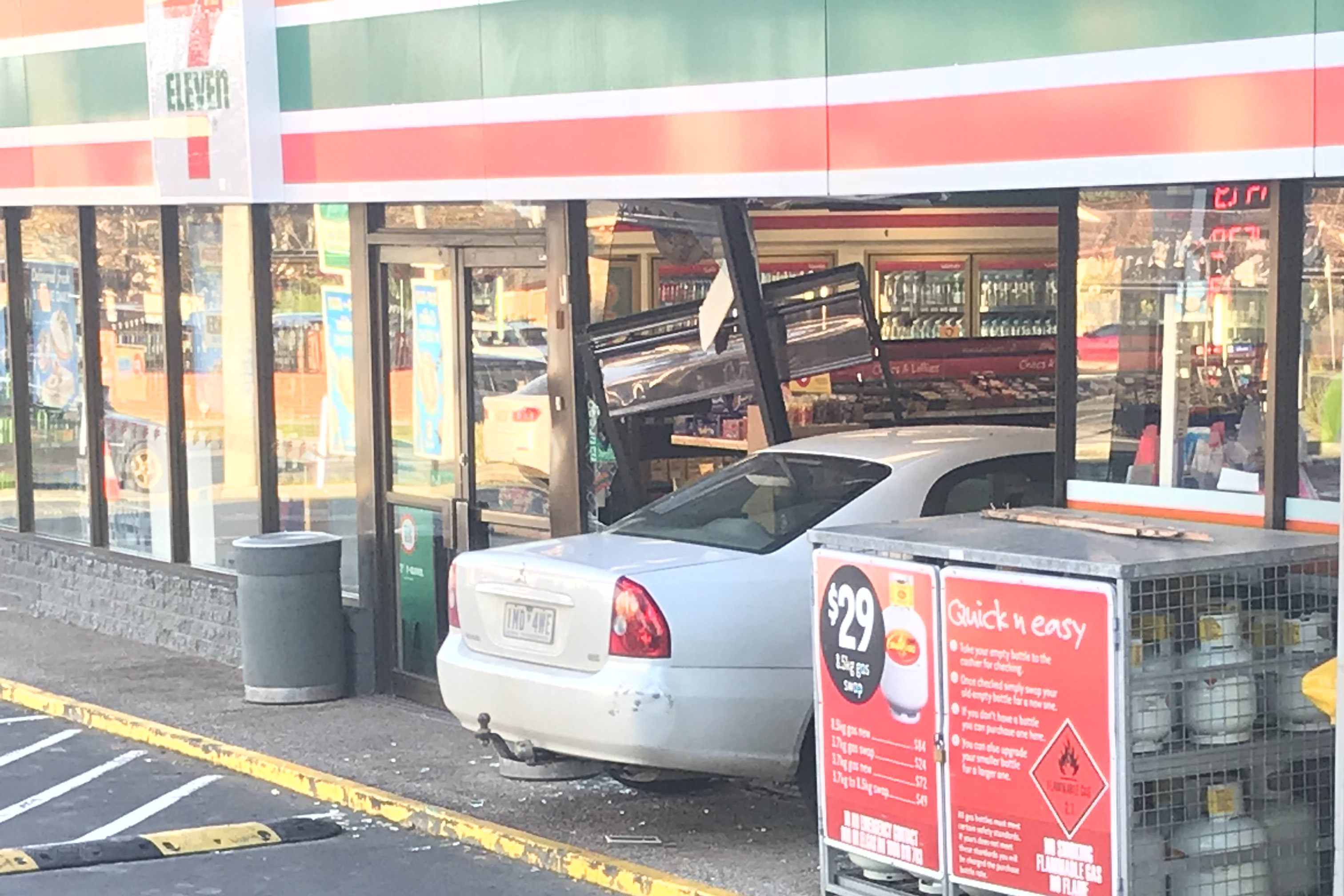 Article image for Lucky escape for driver and staff as car ploughs into 7-Eleven