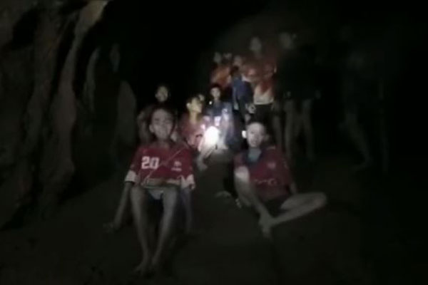 Article image for Scenes of jubilation as missing Thai boys and soccer coach found alive after 9 days in cave