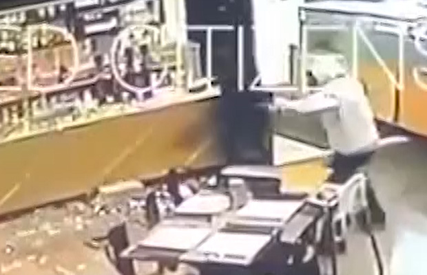 Article image for Video: Pizza shop and bottle store smashed up in terrifying armed robbery