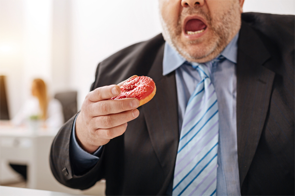 Article image for Working long hours could be contributing to Australia’s obesity problem