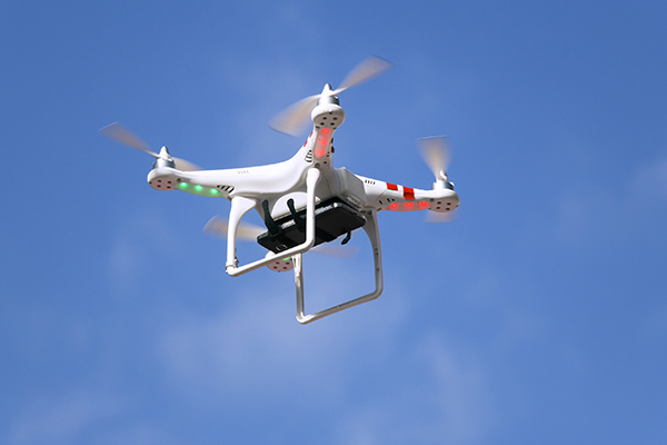 Article image for Mum ‘intimidated’ by drone hovering over young daughters swimming at the beach