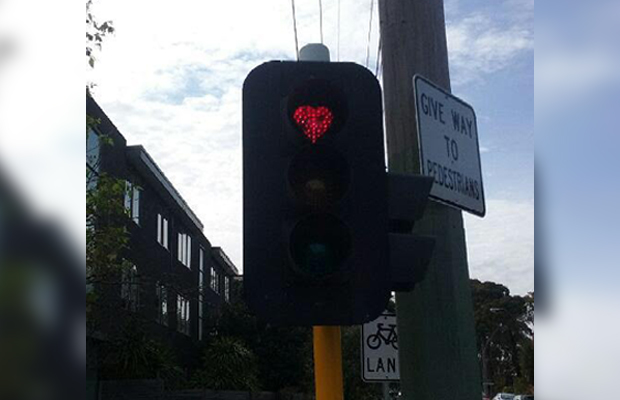 Article image for ‘These lights are bizarre!’: Heart-shaped traffic lights in St Kilda won’t be there much longer