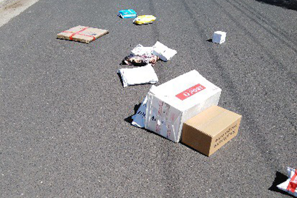 Article image for Resident finds 18 parcels scattered across the road in Hoppers Crossing