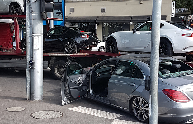 Article image for Flinders St closed after trucks drives ‘straight over the top’ of luxury car