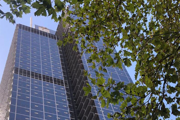 Article image for MFB crews abseiling 45 floors up as sign rips off CBD building in high winds