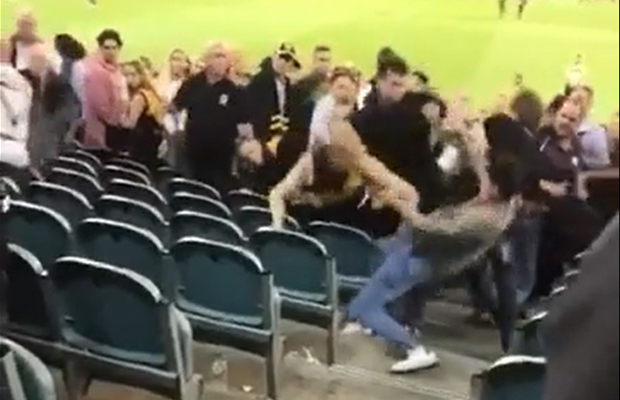 Article image for Footy brawl: Fists fly, teen arrested in the MCG stands