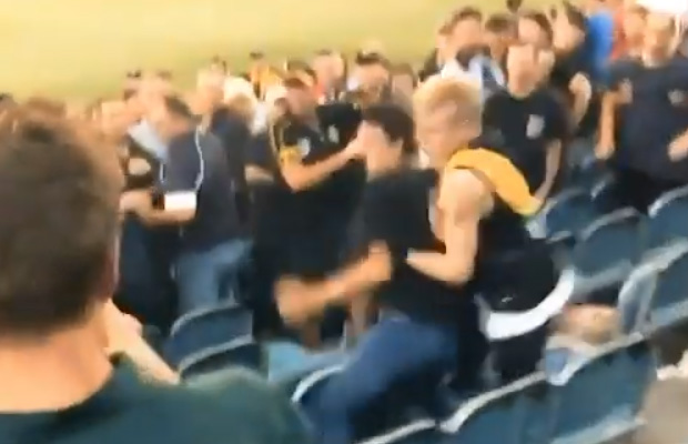 Article image for Three men charged over ‘disgraceful’ MCG footy brawl