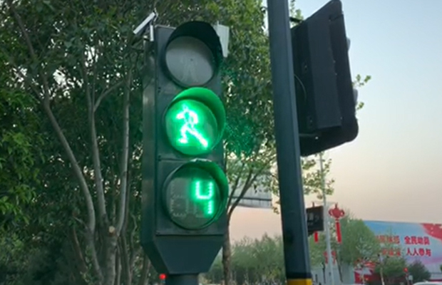 Article image for Ross and John LOVE this pedestrian crossing sign in China!