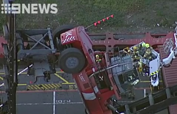 Article image for Worker trapped as container forklift flips at West Melbourne