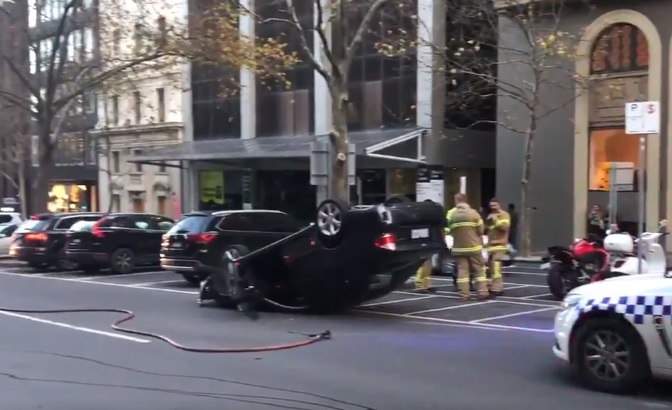 Article image for Car flips on Exhibition Street in the CBD