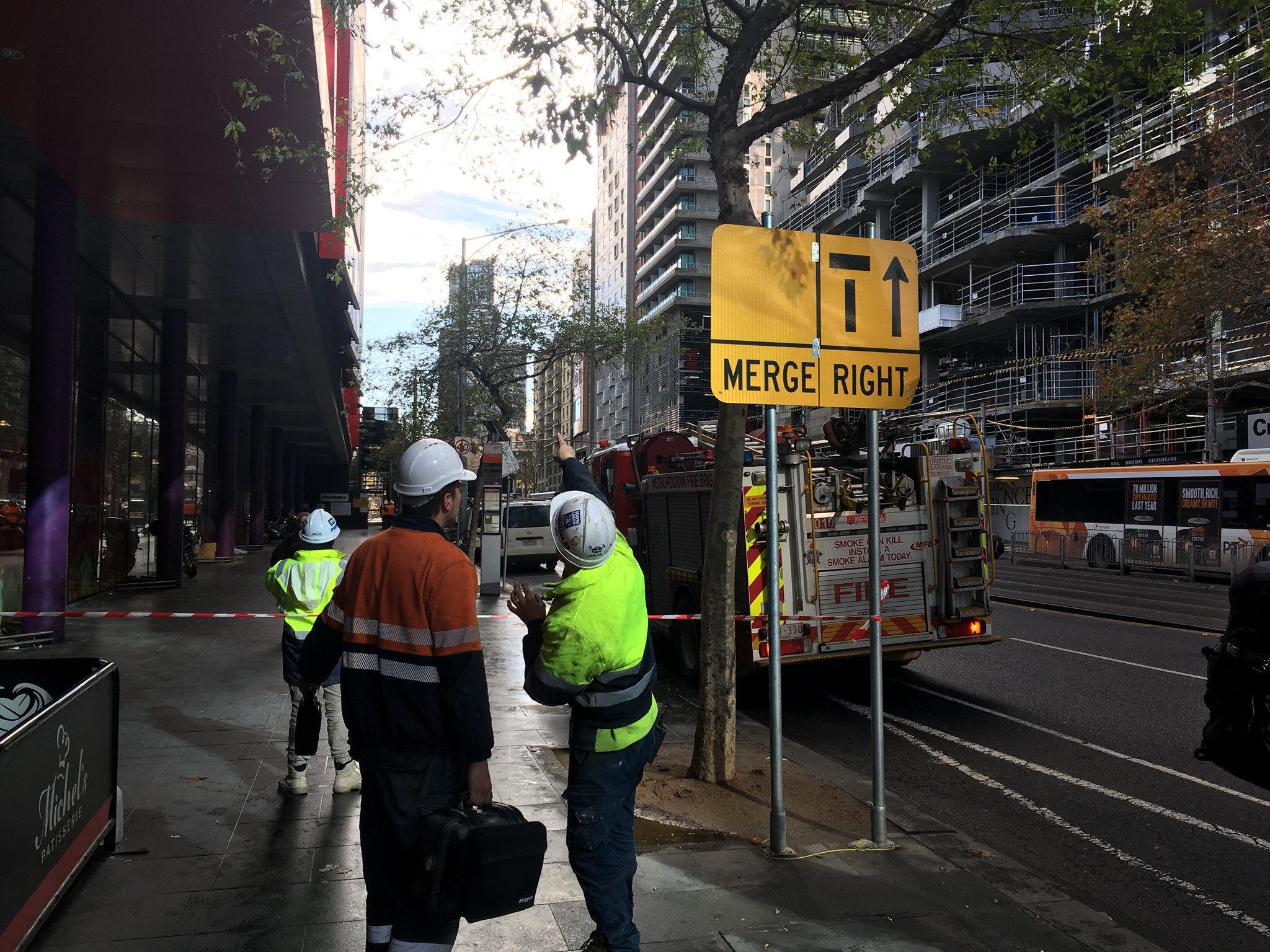 Article image for Broken crane leaves tonnes of glass dangling over CBD