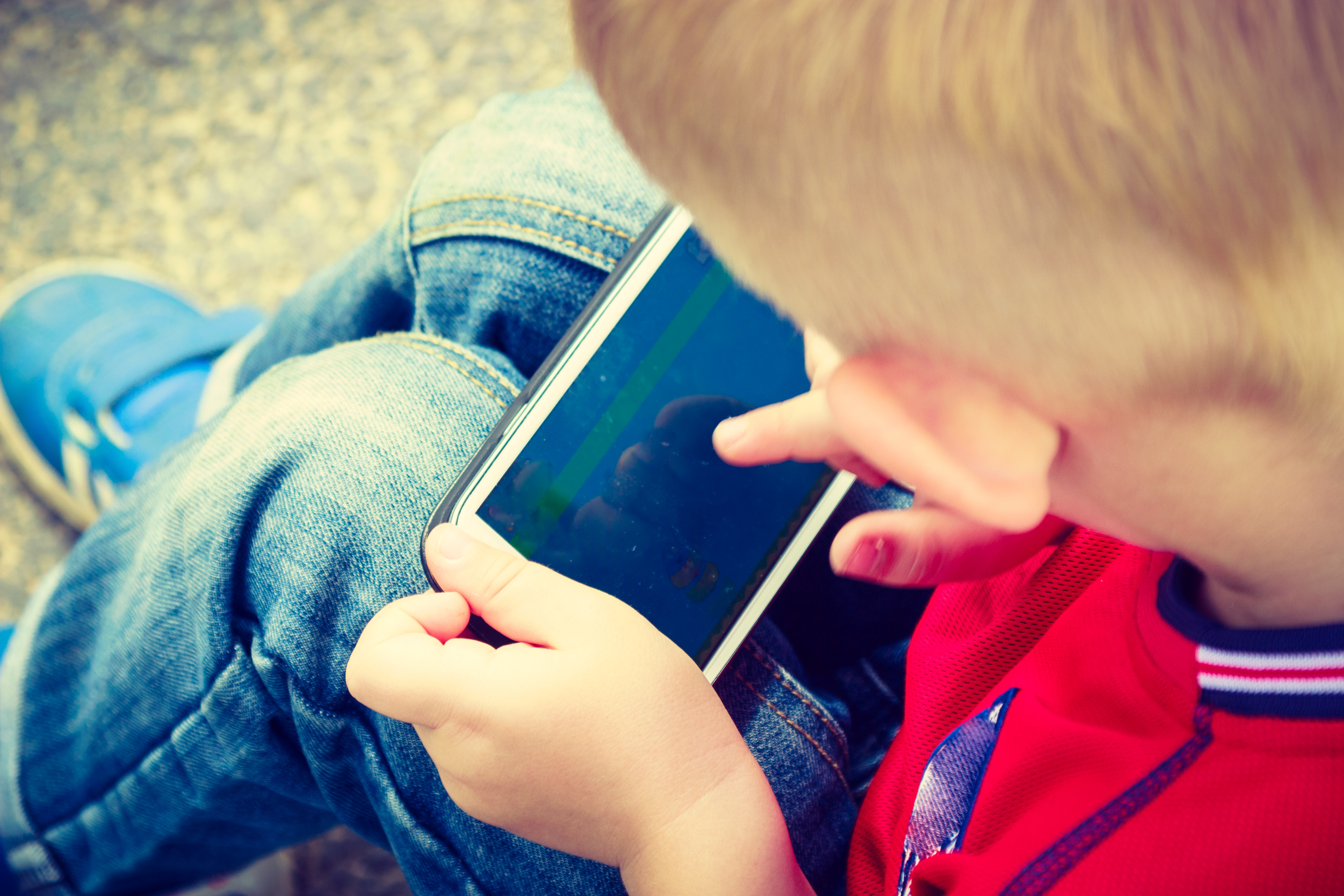 Article image for Push to withhold smartphones from children as screen time soars