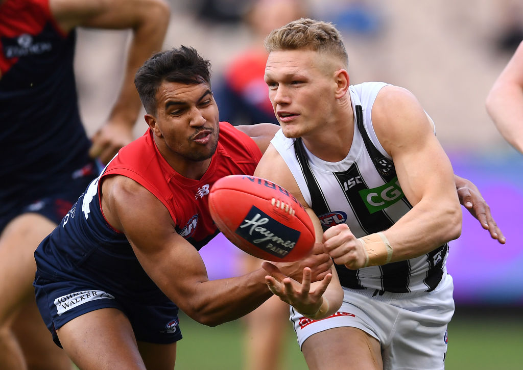 Article image for Pies prevail despite spirited Demons fightback