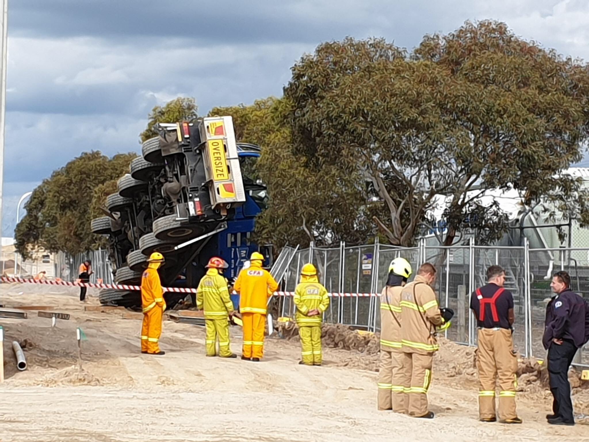 Article image for Crane topples at Clyde North, cutting power to thousands of homes