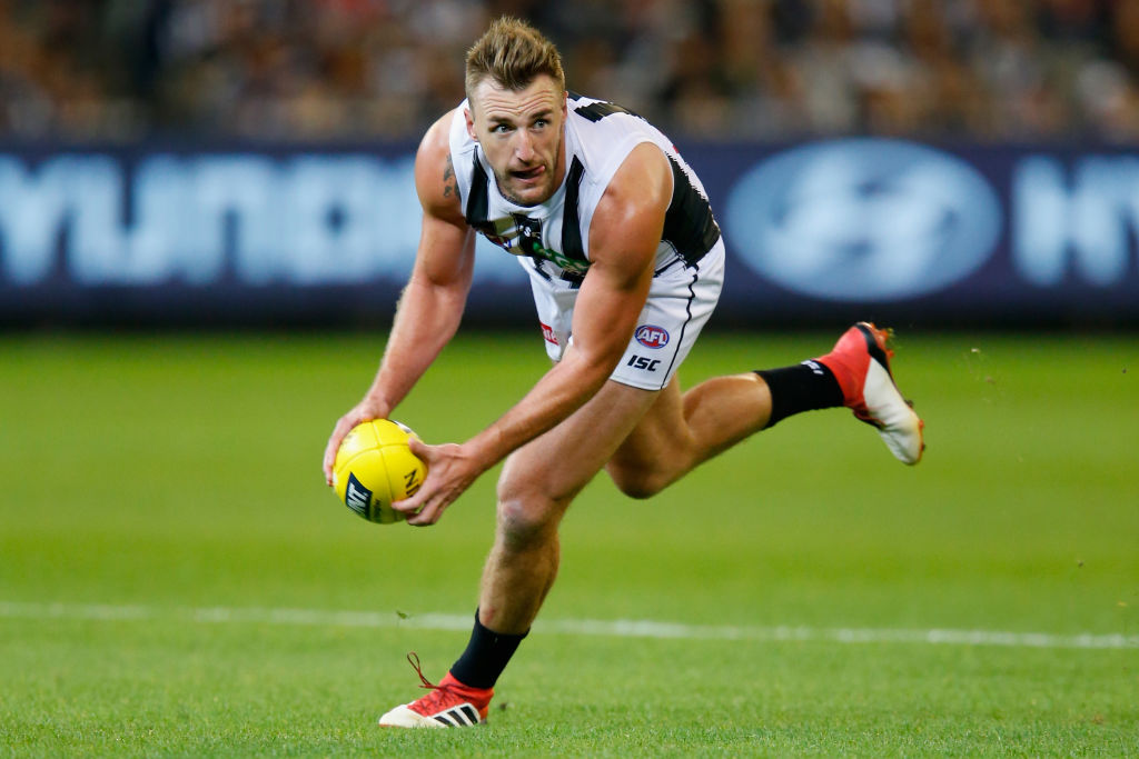 Article image for Collingwood delists three players, including Lynden Dunn